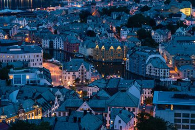 Old town of Alesund city at night in summer season, western Norway, Scandinavia, Europe clipart