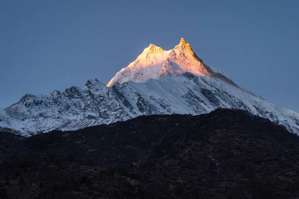 Manaslu mountain peak at sunrise, eighth highest peak in the world in Himalaya mountains range, Nepal, Asia