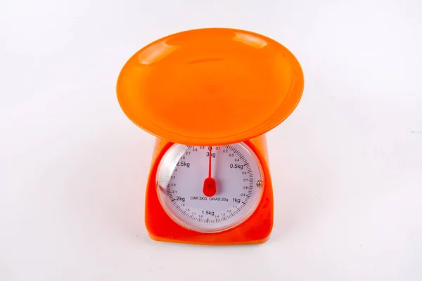 Pomiar Masy Pomarańczowy Kolor Równowagi Białym Tle — Zdjęcie stockowe