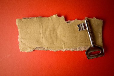 Başarı kavramsal rustik kahverengi kurulda ve anahtar.