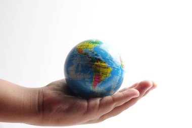 Bir palm üzerinde beyaz bir dünya dünya. Küreselleşme kavramı