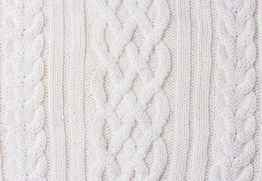 Sıcak beyaz örgü öğelere örgüler ve desen