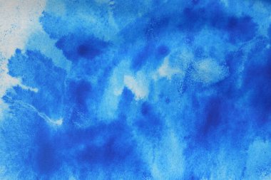 Soyut Mavi el boyalı mürekkep ve suluboya splash Beyaz Kağıt arka planda, yaratıcı tasarım şablonları