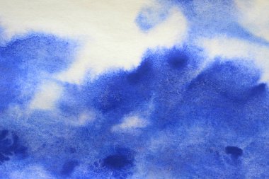 Beyaz kağıt geri üzerinde mavi suluboya sıçrama soyut el boyalı