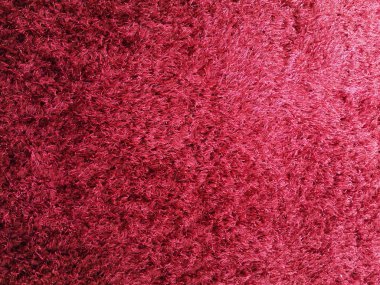 Kırmızı yumuşak pamuk koyun yünü kabarık kürk halı doku arka plan