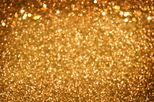Золотий блиск іскровий фон. Різдвяні розфокусовані вогні — стокове фото