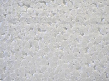 Beyaz strafor köpük yakın plan arkaplan dokusu, köpük plastik duvar kağıdı. Yüksek kaliteli makro fotoğrafçılık.