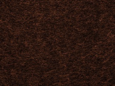 Kahverengi bronz kumaş lifli dokuya yakın çekim. Fiberlerin çoğulculuğu birbirine dokunur ve tek bir yüzey yapısı oluşturur. Birçok görev için iyi bir duvar kağıdı ya da arka plan. Makro fotoğrafçılık.