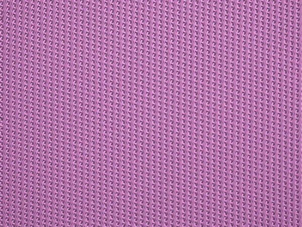 Pembe kumaş plastik tekstil kafes ya da ızgara dokusu yakın plan. Yatay ve dikey kesişen çizgiler. Birleştirilmiş pembe plastik tekstil desenli şeritlerin bir kafes çalışması bir kalıp arkaplan oluşturur