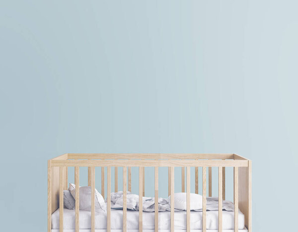 деревянная кроватка для новорожденного ребенка в современном зеленом интерьере