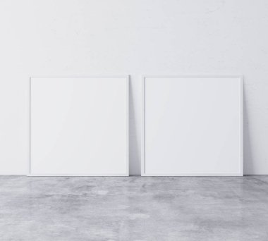 Kare çerçeveler maket yapar. Beton zeminde duran iki sahte poster, üç boyutlu illüstrasyon