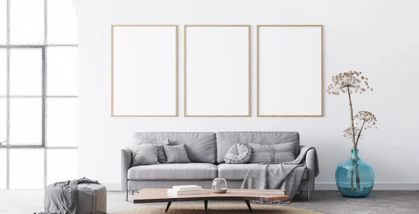 室内リビングルームデザインのフレームモックアップ 大きな窓を持つ白い背景に3つの垂直フレーム 現代のグレーのソファと天然木のテーブル 北欧の家の装飾 3Dレンダリング — ストック写真
