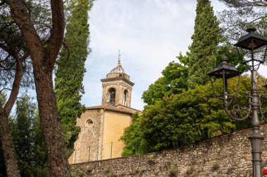 San Gemini, Italy June 13 2020: Bell tower of Santo Gemini in the town of San Gemini medieval age