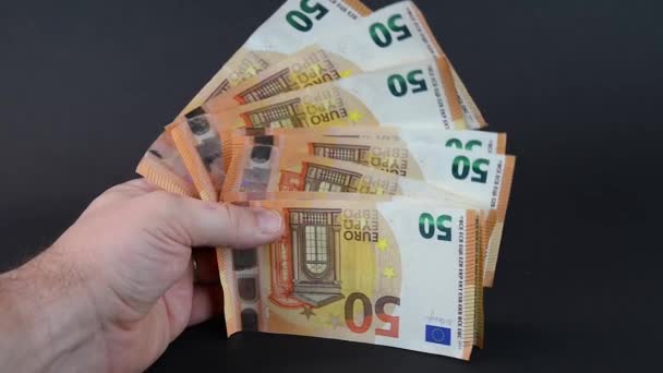 Homem Com Notas Euro Segurando Forma Ventilador — Vídeo de Stock