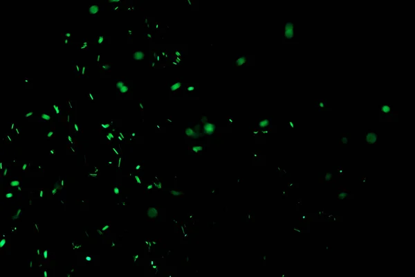 Siyah arka planda mavi kıvılcımlar