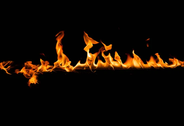 Bar of fire on a black background