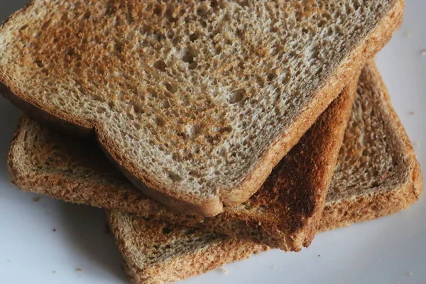 Freshly made sliced bread toasts.