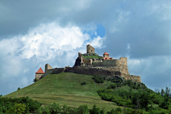 Rupea Citadel seen from the E60 road in Romania. The citadel is located on top of the Cohalmului hill, located in the northern part of the city of Rupea.