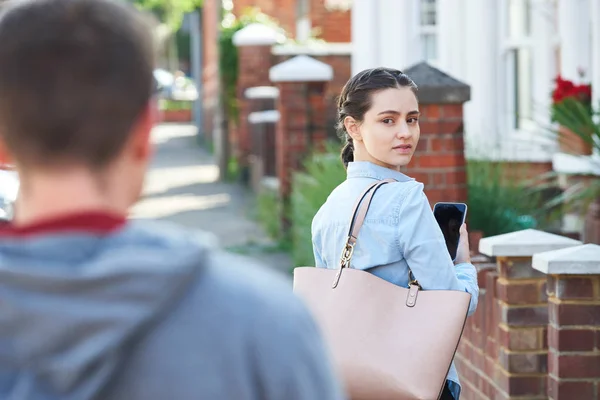 Young Woman Texting Help Mobile Phone Whilst Being Stalked City — Stock Photo, Image