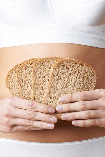 Close Mulher Vestindo Roupas Íntimas Segurando Fatias Pão Marrom — Fotografia de Stock