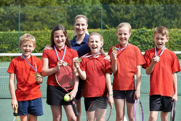 Portrait Winning School Tennis Team Medals — стоковое фото