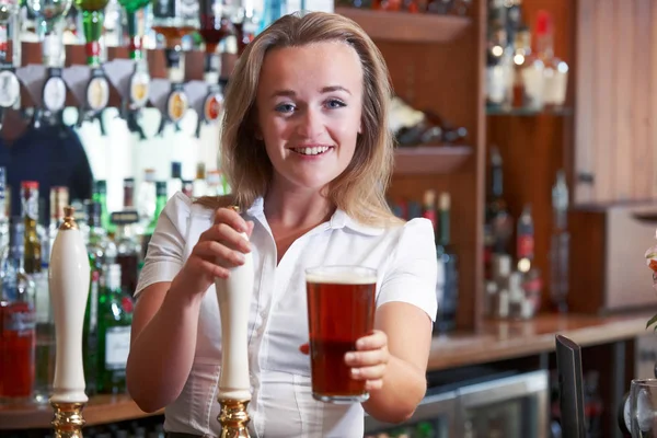 Female Bartender Serving Beer Counter — Stock Photo, Image