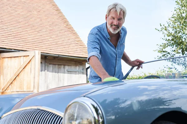 Portrait Of Mature Man Polishing Restored Classic Sports Car Out — Stock Photo, Image