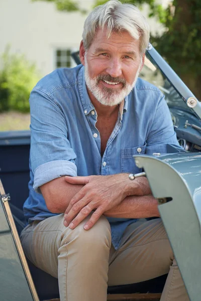 Portrait Of Proud Mature Man Sitting In Restored Classic Sports — Stock Photo, Image