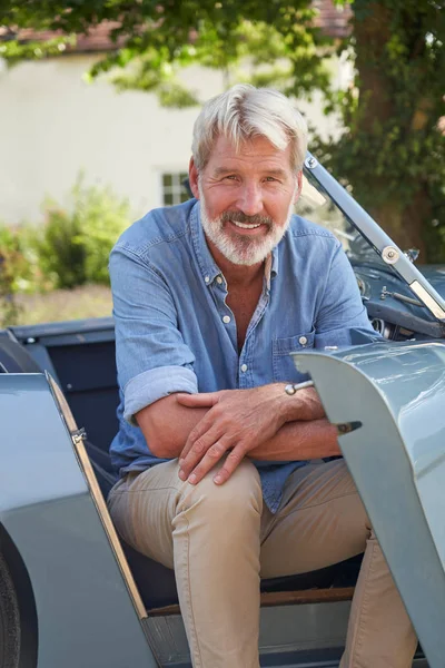 Portrait Of Proud Mature Man Sitting In Restored Classic Sports — Stock Photo, Image