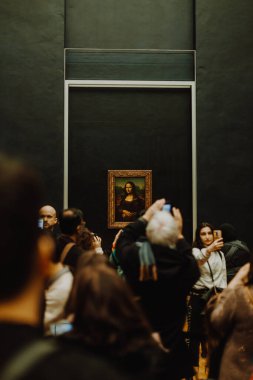 13:02:2020 Paris, France: People waiting on queue to see the Mona Lisa painting at the Louvre Museum (Musee du Louvre) clipart