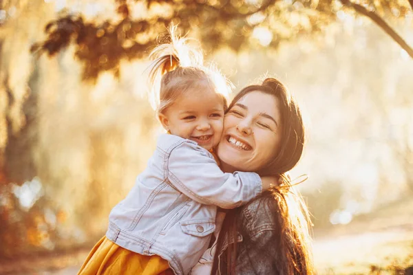 Young Happy Smiling Mom Her Little Daughter Arms Hugging Kissing — Stock Photo, Image