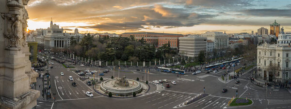 Aerial view of Cibeles fountain at Plaza de Cibeles in Madrid at sunset
