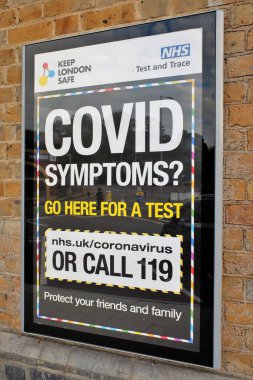 Londra 'yı güvenli ve NHS testi ve Covid semptomlarıyla ilgili poster tabelasını koru, teste gir. Aileni ve arkadaşlarını koru..