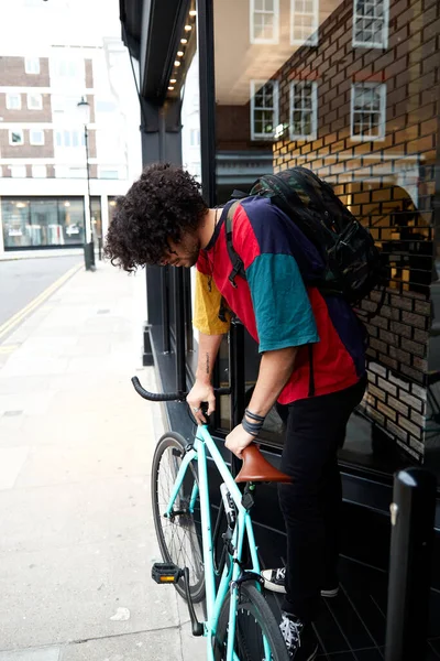 Generation Z on bike in urban area. Fixed gear bike in a suburb of London.