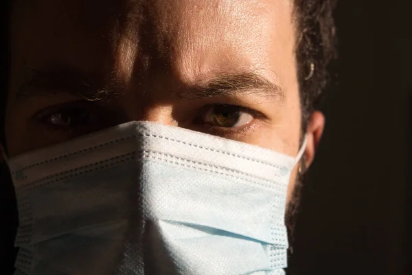 Young man wearing a protection mask portrait