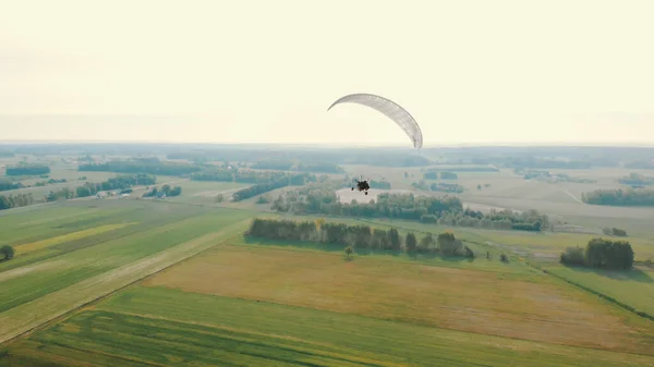 Paraglider flying in the air - countryside of Poland — Stock Photo, Image