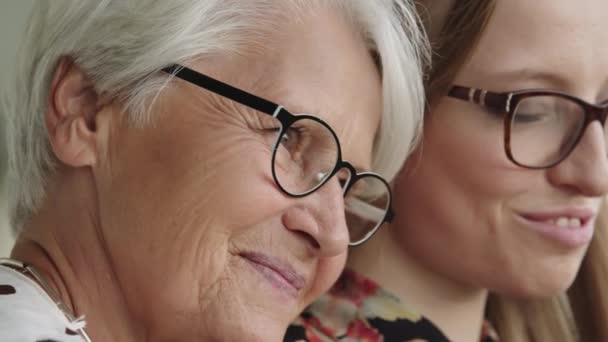 Emotional bounding of young and senior woman. Mother and daughter. Close up — Stock Video