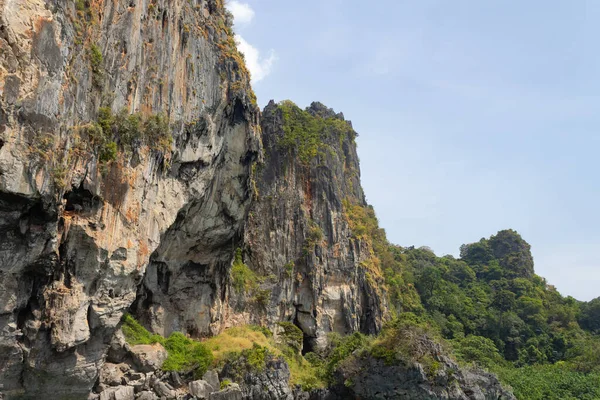 Yellow grey beautiful rock against the blue sky — Stock Photo, Image