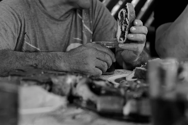 Photo of the people eating food.