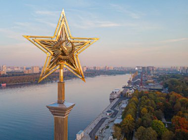 View from the height of the star with a hammer and sickle on top of the building of the North River terminal or Rechnoy Vokzal in Moscow. clipart