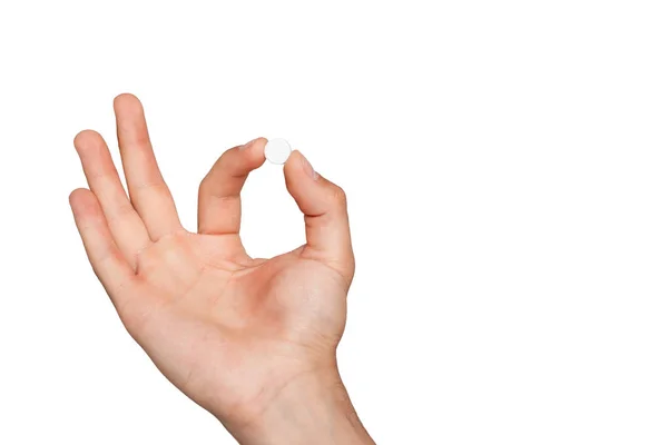 Pill in mans hand on white background — Stock Photo, Image
