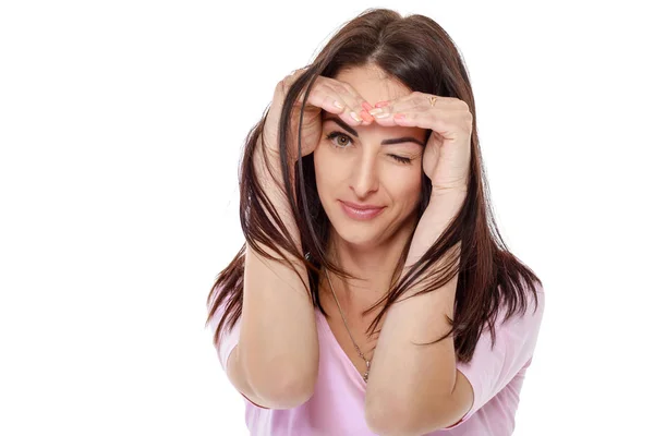 Beautiful brunette woman in pink t-shirt — Stock Photo, Image