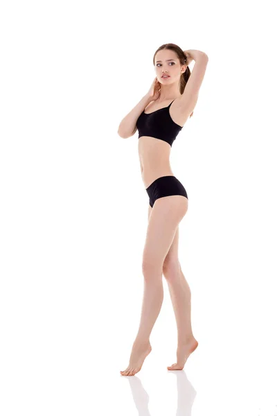 Mujer con cuerpo deportivo perfecto en lencería negra — Foto de Stock