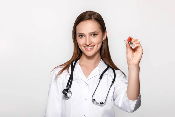 Doctor hand with pen pointing on something. — Stock Photo, Image