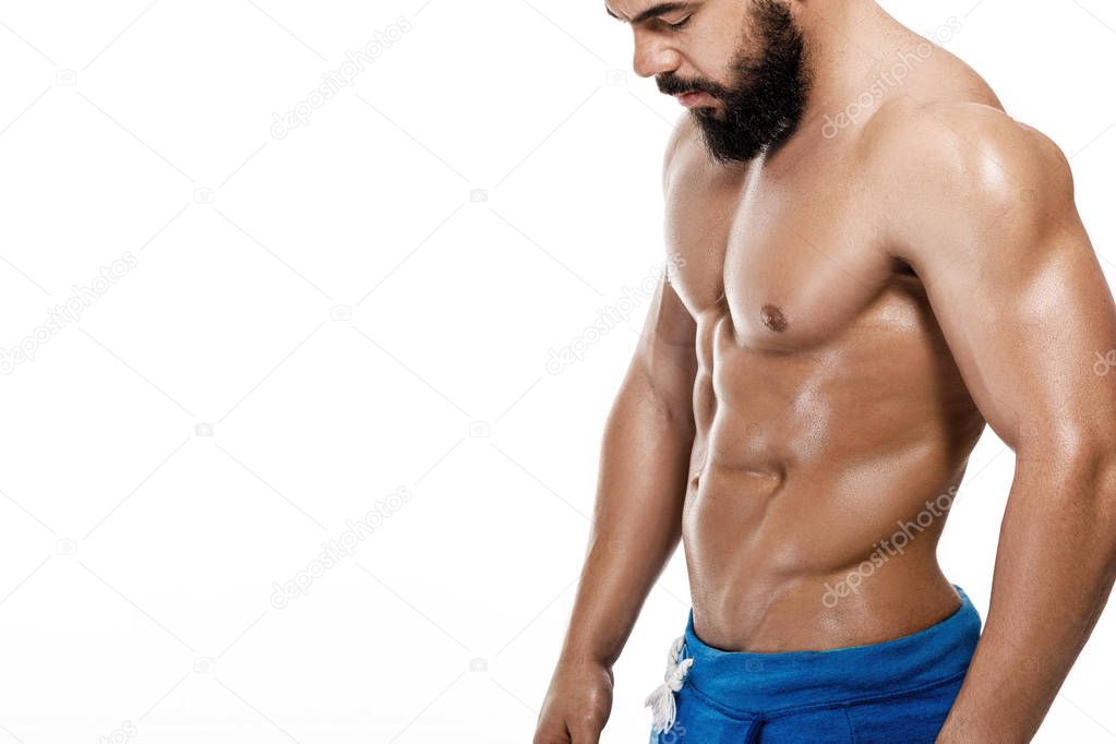 man bodybuilder showing muscular body.