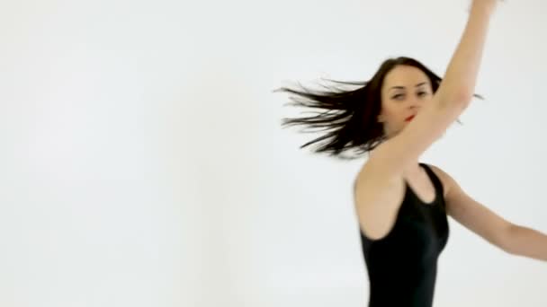 Woman dancing and looking at camera — Stock Video