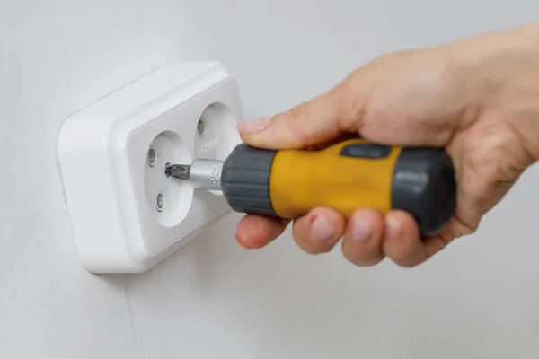 Electrician installing electrical socket — Stock Photo, Image