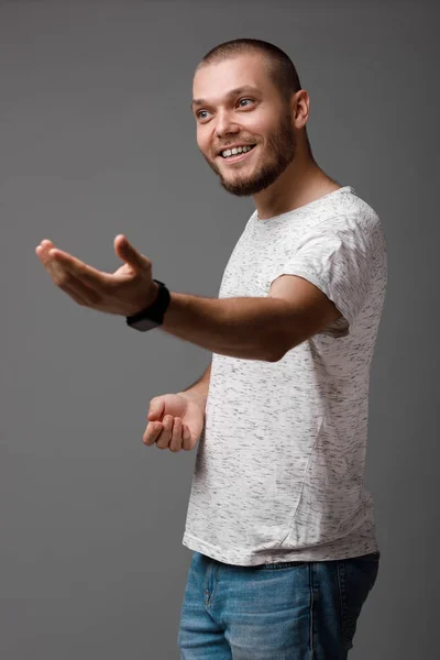 Man showing welcome gesture — Stock Photo, Image