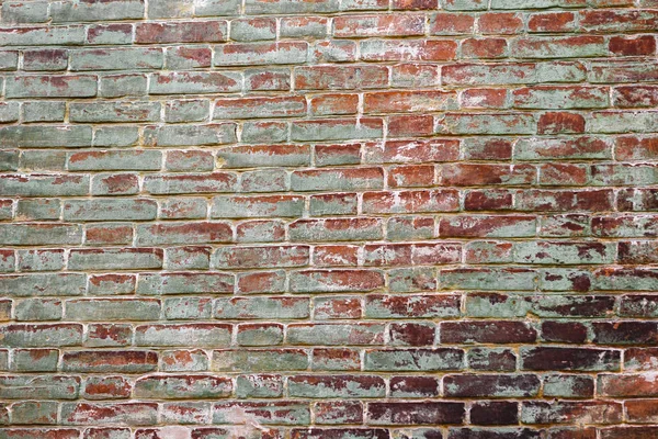 Parede de tijolo vermelho velho. o fundo grunge — Fotografia de Stock