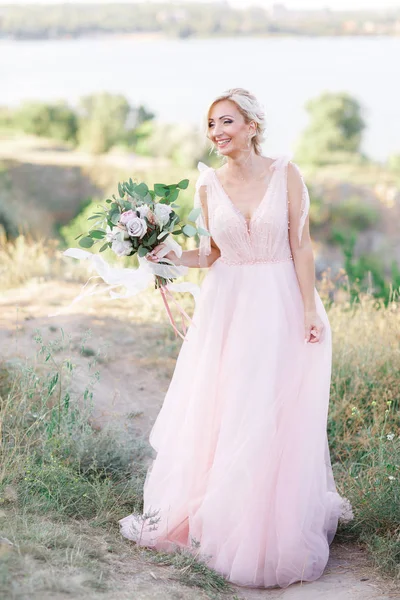 Portrait of beautiful bride in the nature.